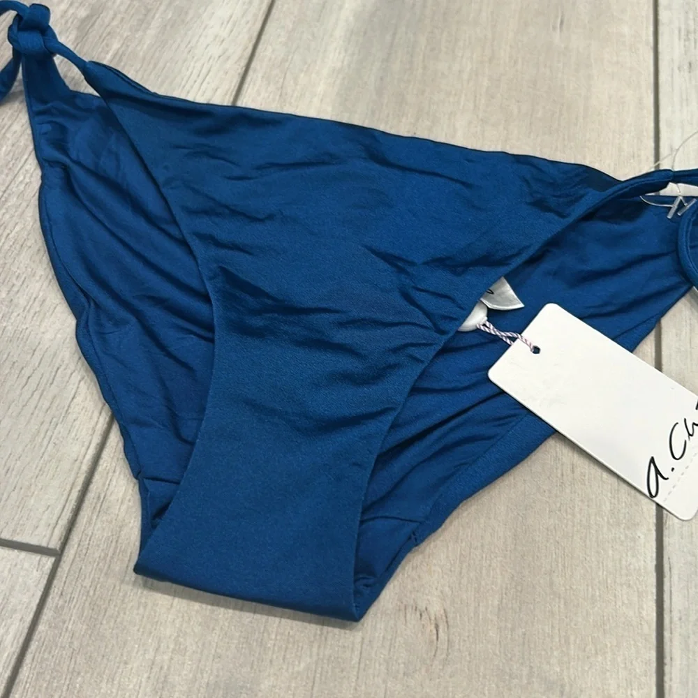 A. Che Jolie string ink blue swim bikini bottom size XS